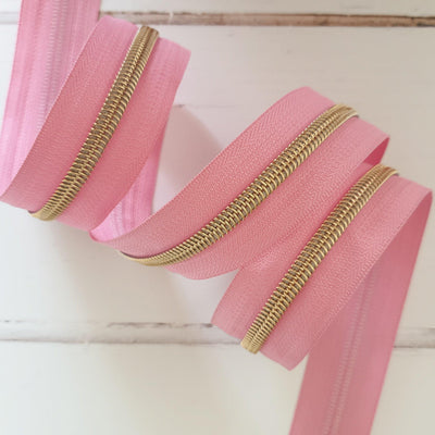 Pink Zipper Tape with Light Gold Coil Teeth - Size 5 Zip - Shop online and in store at Purple Stitches, Basingstoke, Hampshire UK
