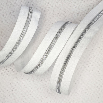 White Zipper Tape with Silver Coil Teeth - Size 5 Zip - Shop online and in store at Purple Stitches, Basingstoke, Hampshire UK