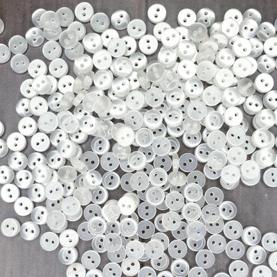 6mm Mini Round 2-hole Plastic Buttons - Semi Transparent White - Purple Stitches
