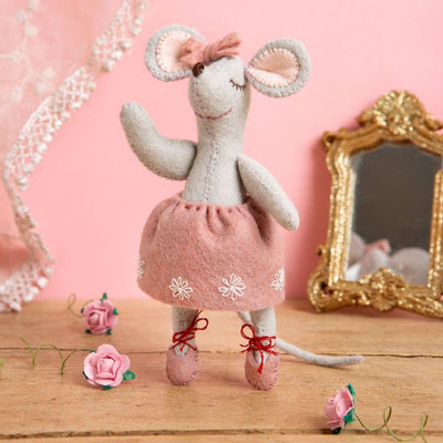 Toy mouse in a pink dress with flowers and a mirror on a wooden surface Corinne Lapierre Little Mouse the Ballet Dancer Felt Craft Mini Kit – complete wool felt sewing kit with materials and instructions to hand-stitch a ballet dancer mouse