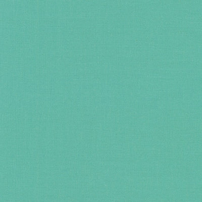 Kona Cotton Solid Fabric in Sage (K001-1321) by Robert Kaufman. 100% premium cotton in a soft, muted green. Ideal for quilting, patchwork, dressmaking, and crafts. This high-quality plain dyed cotton features a smooth finish and consistent colour. A classic addition to any fabric stash.