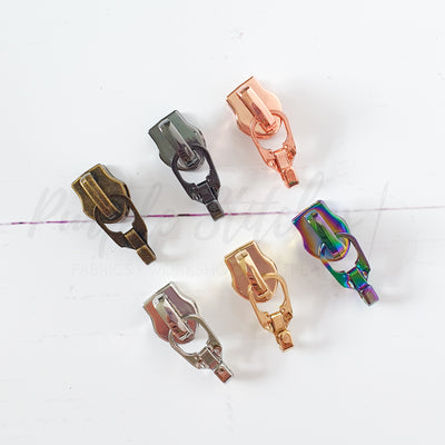 Metal #5 zipper pulls in assorted finishes – gold, silver, rose gold, antique brass, gunmetal and rainbow – compatible with #5 continuous zipper tape – Purple Stitches