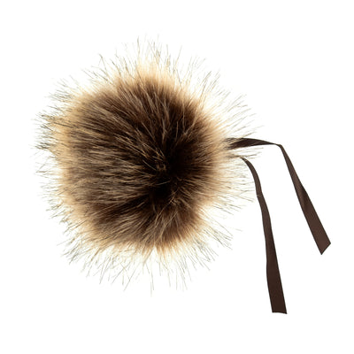 Fur pom-pom with a brown ribbon on a white background Faux Fur Pom Pom 11cm – Soft, fluffy pom pom accessory for hats, scarves, bags, keyrings, and crafts – available in multiple colours
