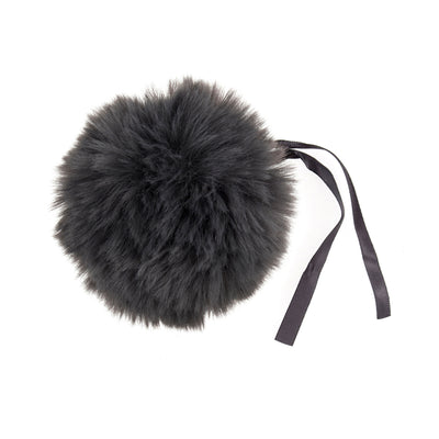 grey fur pom-pom with a black ribbon on a white background. Faux Fur Pom Pom 11cm – Soft, fluffy pom pom accessory for hats, scarves, bags, keyrings, and crafts – available in multiple colours