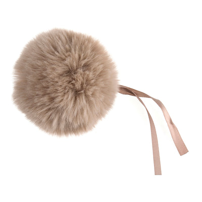 Beige fur pom-pom with a ribbon on a white background Faux Fur Pom Pom 11cm – Soft, fluffy pom pom accessory for hats, scarves, bags, keyrings, and crafts – available in multiple colours