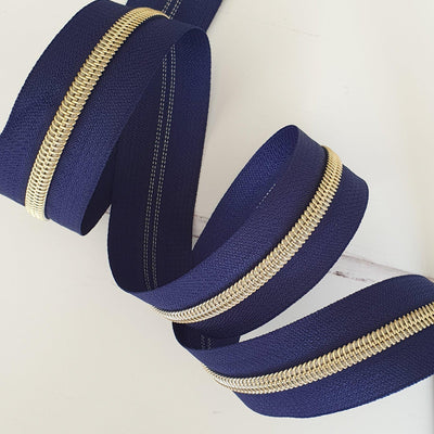 Navy Blue Zipper Tape with Light Gold Coil Teeth - Size 5 Zip - Shop online and in store at Purple Stitches, Basingstoke, Hampshire UK