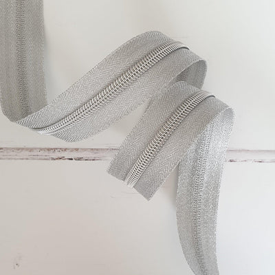 Silver Metallic Zipper Tape with silver Coil Teeth - Size 5 Zip - Shop online and in store at Purple Stitches, Basingstoke, Hampshire UK