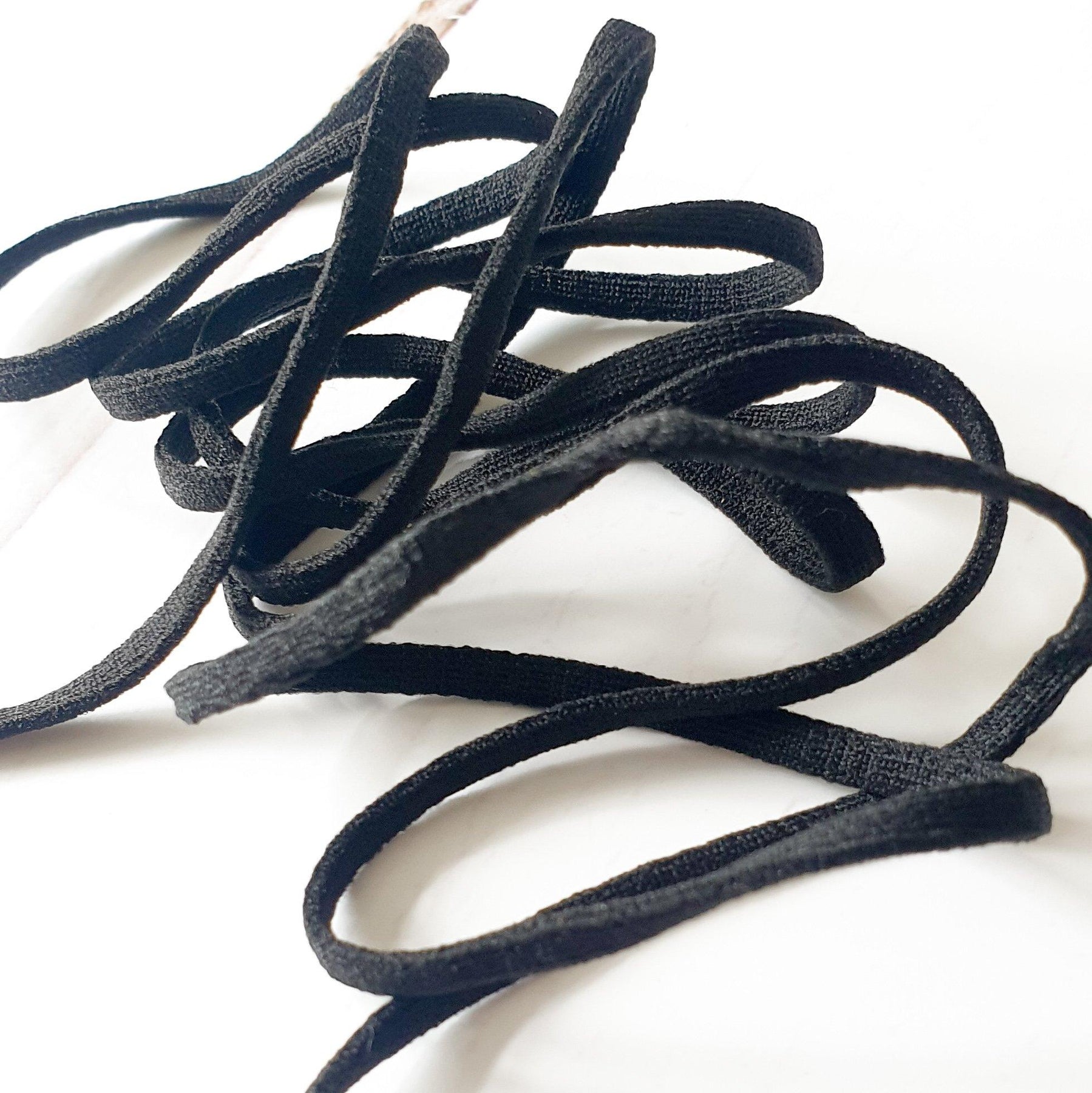 4mm / 1/8 BLACK flat soft tubular elastic cord – Purple Stitches