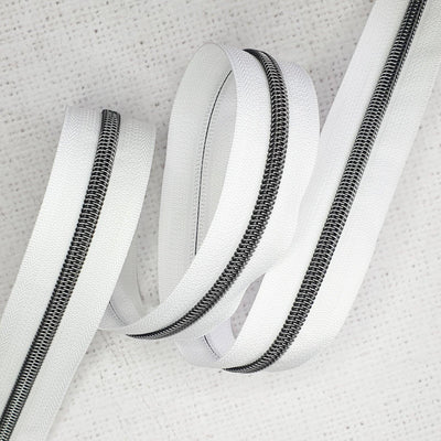 White Zipper Tape with Gunmetal Coil Teeth - Size 5 Zip - Shop online and in store at Purple Stitches, Basingstoke, Hampshire UK