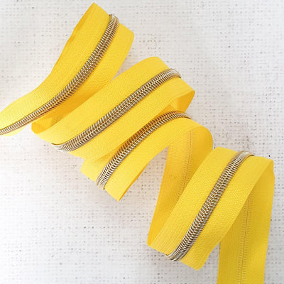 Yellow Zipper Tape with Light Gold Coil Teeth - Size 5 Zip - Shop online and in store at Purple Stitches, Basingstoke, Hampshire UK