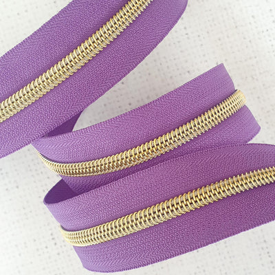 Purple Zipper Tape with Light Gold Colour Coil Teeth - Size 5 Zip - Shop online and in store at Purple Stitches, Basingstoke, Hampshire UK