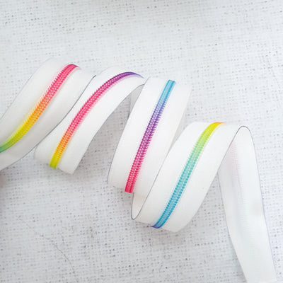 White Zipper Tape with Bright Rainbow Colour Coil Teeth - Size 5 Zip - Shop online and in store at Purple Stitches, Basingstoke, Hampshire UK