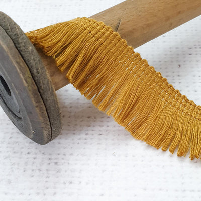 Old Gold 1" Fringe Trim - Shop online and in store at Purple Stitches, Basingstoke, Hampshire UK